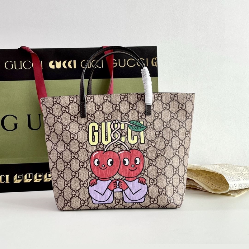 G*u*i shopping bags
